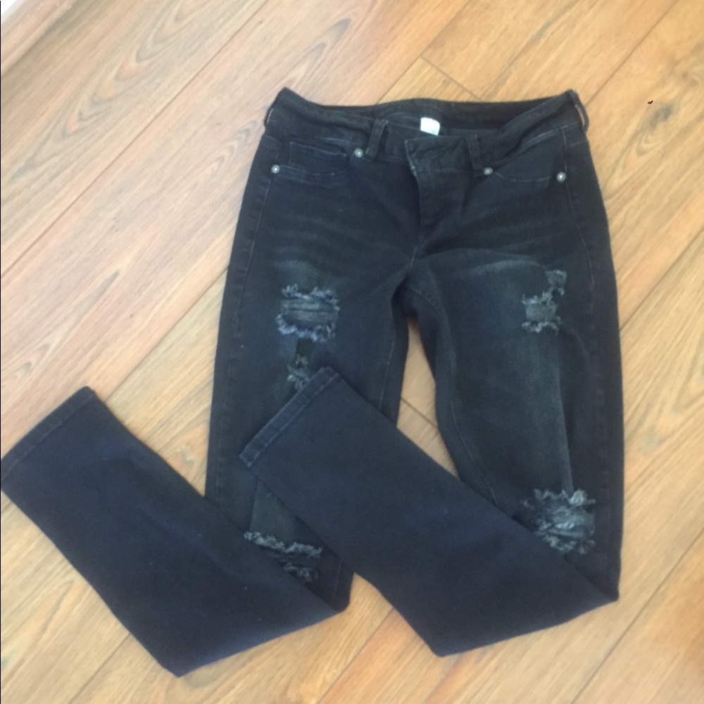 Distressed black maurices jeans
